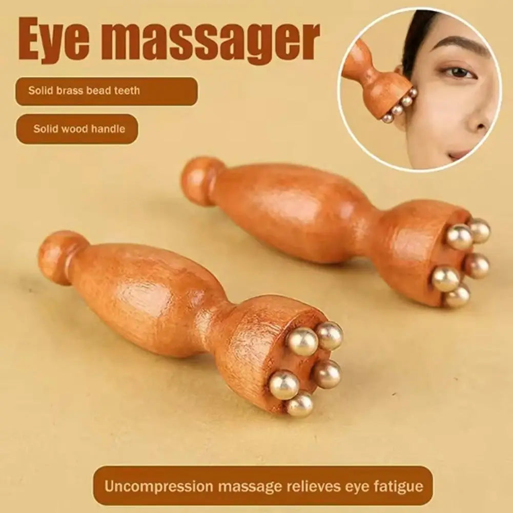 Masajeador de Madera Premium para Contorno de Ojos.